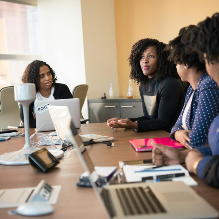 employees gathered on a conference room