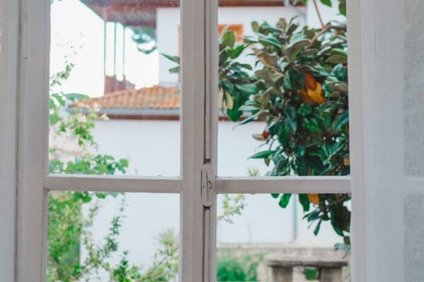 rustic house window with curtains