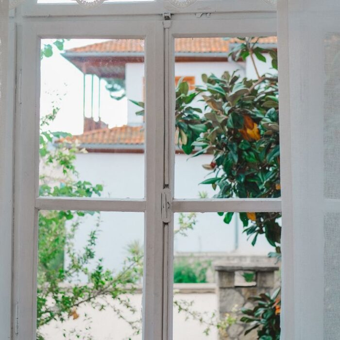 rustic house window with curtains