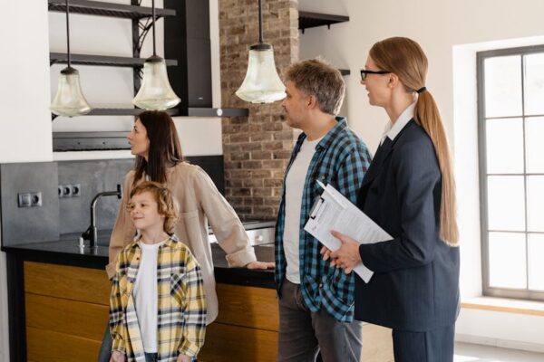 a family with a real estate agent