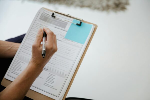 person holding a pen